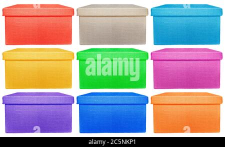 Closed colorful boxes wrapped by burlap canvas isolated on a white background Stock Photo
