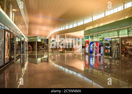 BARCELONA, SPAIN - JULY 14, 2016: The public area at the Terminal T1 of El Prat-Barcelona airport.  Barcelona, Spain - July 14, 2016: The public area Stock Photo