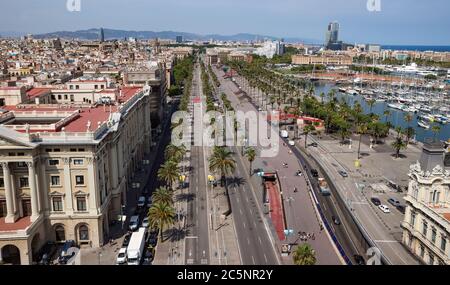 BARCELONA, SPAIN - JULY 4, 2016: La Barceloneta and Port Vell marina from Christopher Columbus monument in Barcelona, Catalonia, Spain  Barcelona, Spa Stock Photo
