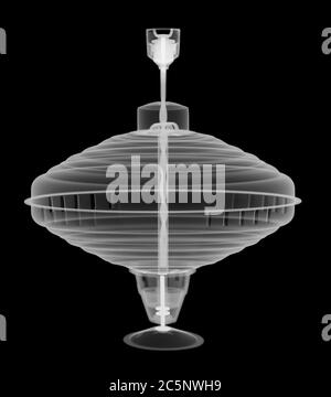 Spinning top, X-ray. Stock Photo