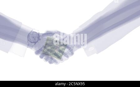 Businessmen shaking hands, coloured X-ray. Stock Photo