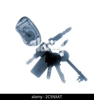 Keys with remote control, coloured X-ray. Stock Photo