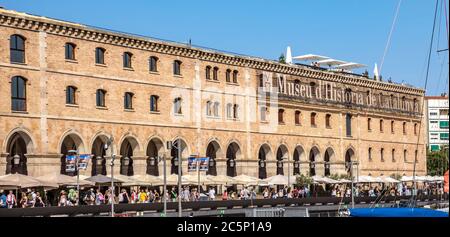 BARCELONA, SPAIN - JULY 4, 2016: Museum of History (Palau de Mar 1880-1890) in front of the harbor.  Barcelona, Spain - July 4, 2016: Museum of Histor Stock Photo