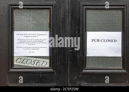 The Hope Pub closed in Southend on Sea, Essex, UK, on 4 July as the country eases further out of lockdown. Notice stating will not open due. Ambiguity Stock Photo