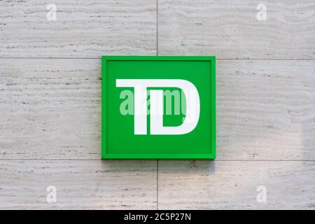 Washington, D.C. / USA - July 03 2020: Sign at the entrance of TD Bank, a subsidiary of the Canadian multinational Toronto-Dominion Bank. Stock Photo