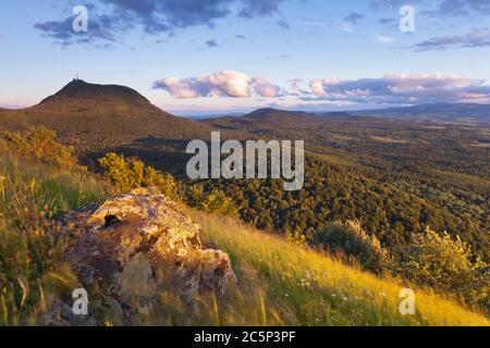 Puy de Dome in the Summer. French Region Auvergne. Fantastic view over the forest and volcanic landscape. Stock Photo