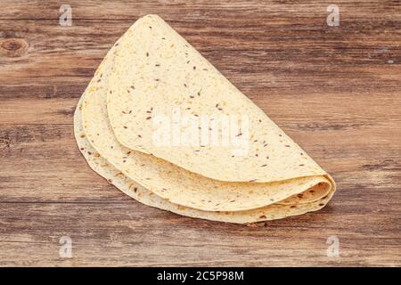Mexican cuisine - Tortilla thick bread with cereal Stock Photo - Alamy