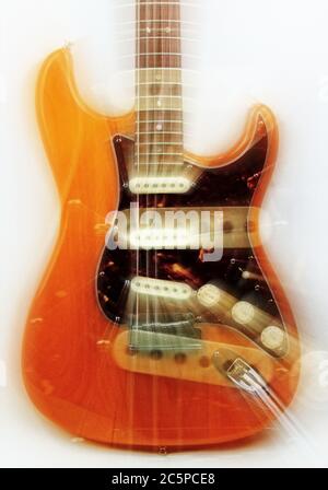 A Fender Stratocaster electric guitar in a multiple zoom step photo. Stock Photo