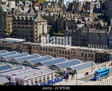 View from above of Waverley Bridge and the Old Town of Edinburgh city centre on sunny day, Scotland, UK