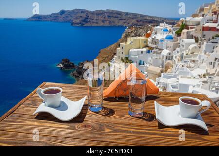 Coffee and Breakfast for two on the beach of Santorini Stock Photo