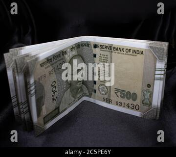 Indian 500 Rupees notes on black background Stock Photo - Alamy