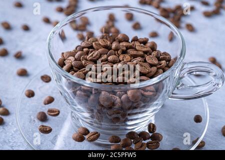 hole coffee beans in a cup Stock Photo