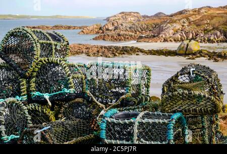 Stacked lobster potson beach, Fionnphort, Isle of Mull, Inner Hebrides, Scotland, UK Stock Photo