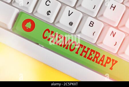 Conceptual hand writing showing Chemotherapy. Concept meaning the treatment of disease by the use of chemical substances Colored keyboard key with acc Stock Photo