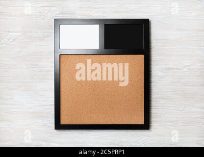 Photo frame on light wood table background. Responsive design template. Flat lay. Stock Photo