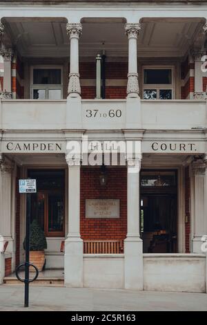London, UK - June 20, 2020: Facade of the Campden Hill Court apartment block in Kensington, an affluent area of West London favoured by celebrities. Stock Photo