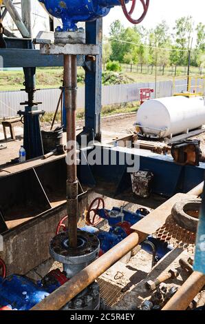 Removing a damaged tubing string from a gas well during a major overhaul Stock Photo