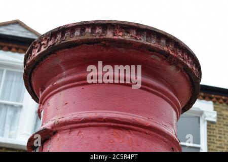 Decaying Post box in south london Stock Photo