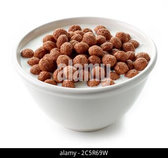 bowl of chocolate breakfast balls with milk isolated on white background Stock Photo