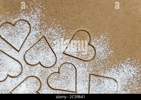spicy ginger dough for heart shaped cookies for valentines present Stock Photo