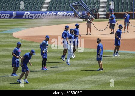 Chicago, United States. 04th July, 2020. Members of the Chicago Cubs warming up during training camp at Wrigley Field on Saturday, July 4, 2020 in Chicago. Major League Baseball is starting their 2020 season after the COVID-19 pandemic caused months of delays. Photo by Kamil Krzaczynski/UPI Credit: UPI/Alamy Live News Stock Photo