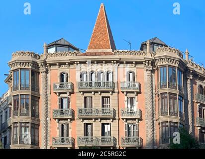 BARCELONA, SPAIN - JULY 14, 2015: Typical architecture of one urban district in Barcelona, Spain.  Barcelona, Spain - July 14, 2015: Typical architect Stock Photo