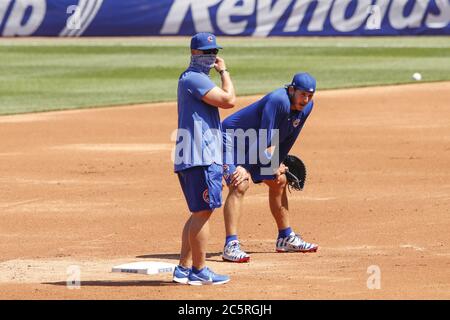 Chicago Cubs' Anthony Rizzo talks to Milwaukee Brewers' Christian Yelich  during the seventh inning of a baseball game Saturday, April 6, 2019, in  Milwaukee. (AP Photo/Aaron Gash Stock Photo - Alamy