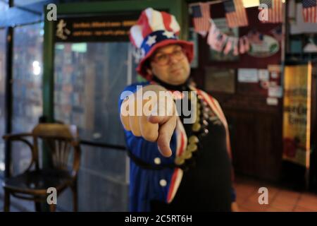 An Israeli man dressed in a particularly patriotic Uncle Sam outfit during United States Fourth of July Independence Day celebration in Mike's Place pub in West Jerusalem Israel Stock Photo