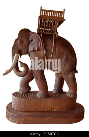 Wooden elephant figurine from Thailand. Clipping Path included. It is not exclusive and is sold as a souvenir. Stock Photo