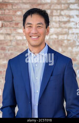 A laughing adult Asian man in San Diego, California Stock Photo