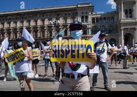 Milan, Italy. 04th July, 2020. Hundreds of flags, T-shirts, banners, signs with the word 'Respect' invaded the center on the occasion of the national mobilization of nurses and health personnel called by the national union Nursing Up in Duomo square Milan. (Photo by Luca Ponti/Pacific Press) Credit: Pacific Press Agency/Alamy Live News Stock Photo