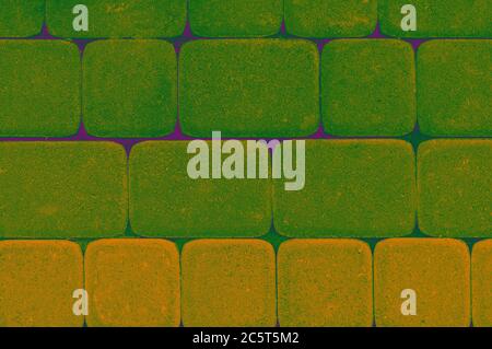 Beautiful multicolored paving stones laid evenly. Bright stylish picture of the tile. Stock Photo