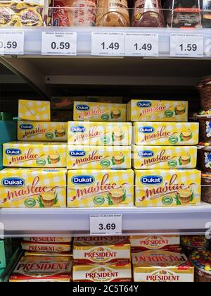 Podgorica, Montenegro - 02 july 2020: Dukat's packets of butter on a shelf at the supermarket. Stock Photo