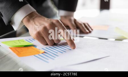 Close up of man work with paper financial documents Stock Photo