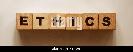 ETHICS word on wooden cubes. Social and business concept Stock Photo
