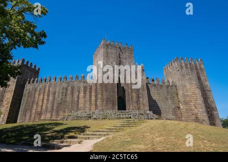 Guimarães, Portugal - Emblematic Medieval Castle in Holy Hill - built under the orders of Mumadona Dias in the 10th century to defend from attacks by Stock Photo