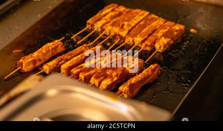 Paneer Satay cooked on a restaurant griddle Stock Photo