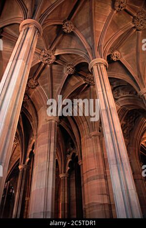 A forest of columns in the entrance hall of the Victorian gothic John Rylands Library, Deansgate, central Manchester, England, UK Stock Photo