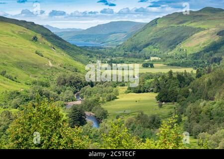 CORRIESHALLOCH GORGE HIGHLANDS SCOTLAND IN SUMMER AND ABHAINN DROMA RIVER WHICH FLOWS THROUGH THE GORGE LOCH BROOM IN THE DISTANCE Stock Photo