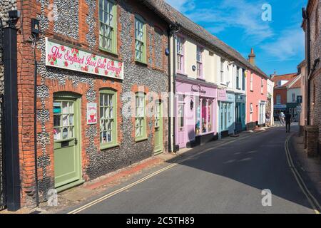 Holt shops, view of a row of bijou shops in Albert Street in the centre of Holt village, Norfolk, East Anglia, England UK Stock Photo