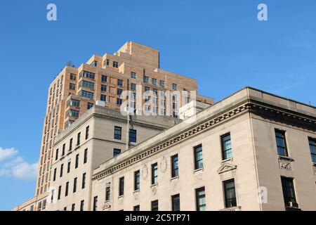 Manhattan School of Music (foreground) and Columbia University residence hall (background). Education in New York City. Stock Photo