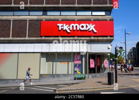 Bromley (Greater London), Kent, UK. TK Maxx store in Bromley High Street and Ringers Road showing the TK Maxx logo. View of the road and a pedestrian.