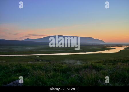 Midnight sunset in Skagafjordur in the north of Iceland Stock Photo