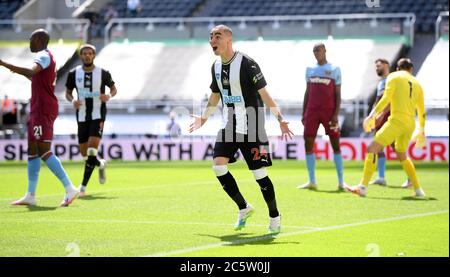 Newcastle United's Miguel Almiron celebrates scoring his side's first goal of the game during the Premier League match at St James' Park, Newcastle. Stock Photo