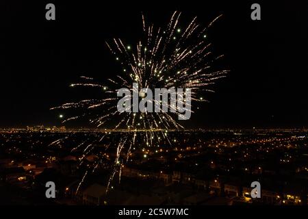 Beautiful fireworks explode in the night sky over the city of Las Vegas, Nevada, on the Fourth of July, America's Independence Day. Stock Photo
