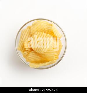 Food at bar for beer. Crispy potato chips in glass plate isolated on white background Stock Photo