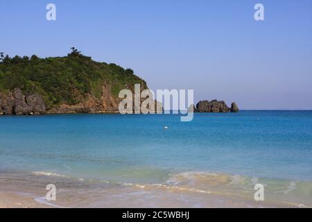 Beach sand & blue ocean sea scenes at Okinawa, Japan Stock Photo