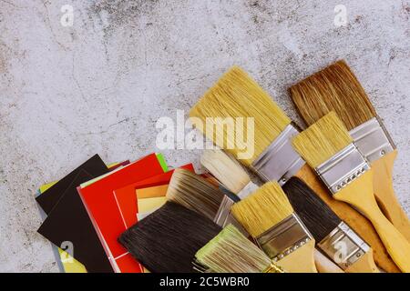 Decorating painting brush tools and color palette choice with copy space on top view Stock Photo