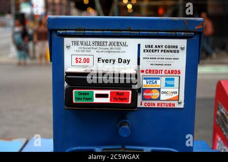 A Wall Street Journal sidewalk newspaper box with credit card payment option Stock Photo