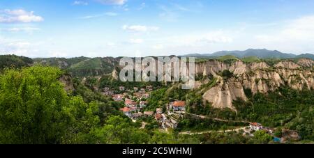 Melnik, Bulgaria and sand pyramids from above. Beautiful landscape of the smallest bulgarian town, mountains at spring. Stock Photo